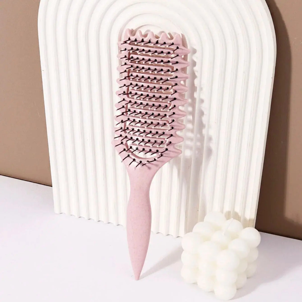 Brosse coiffante pour boucles